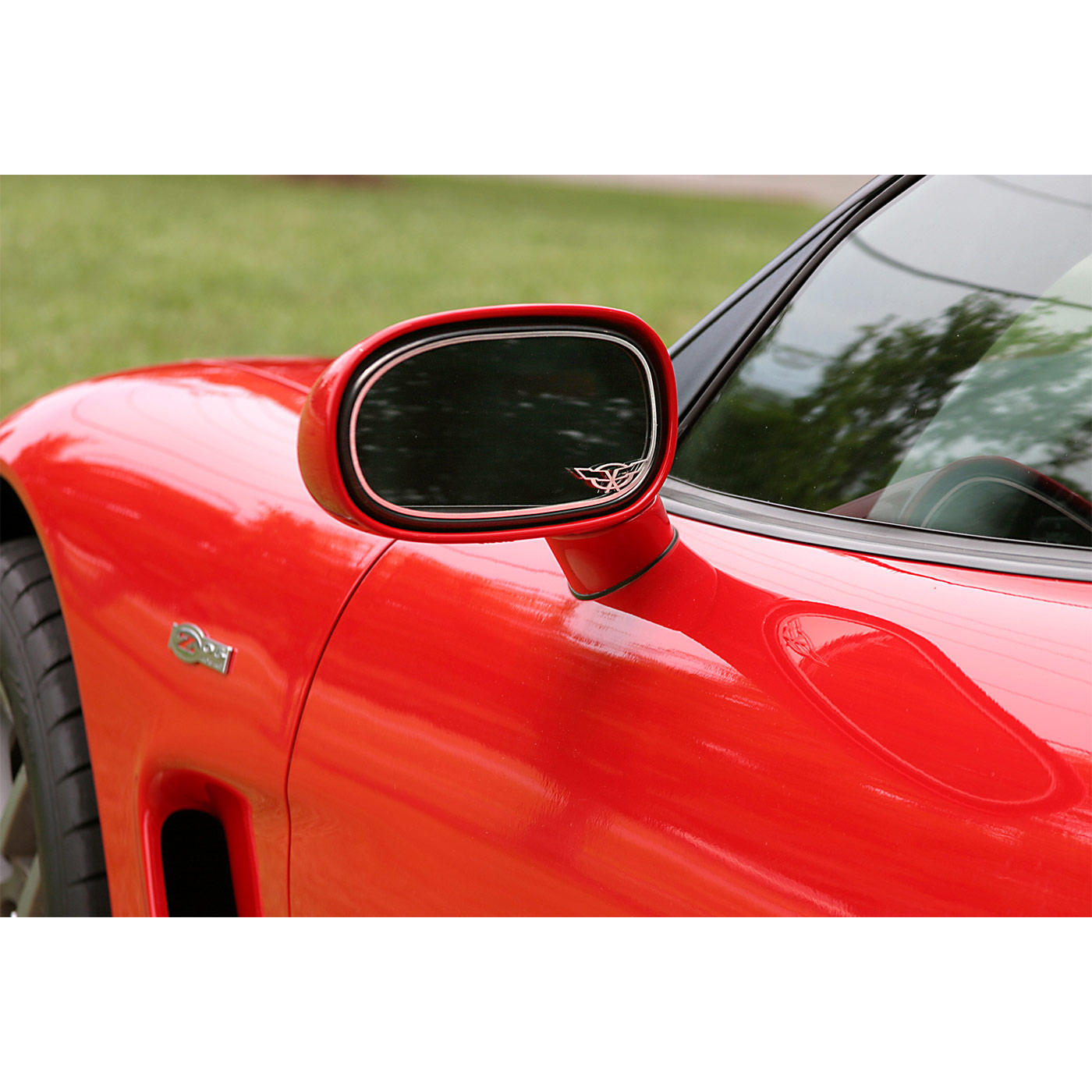 97-04 Exterior Mirror Stainless Trim w/C5 Emblem